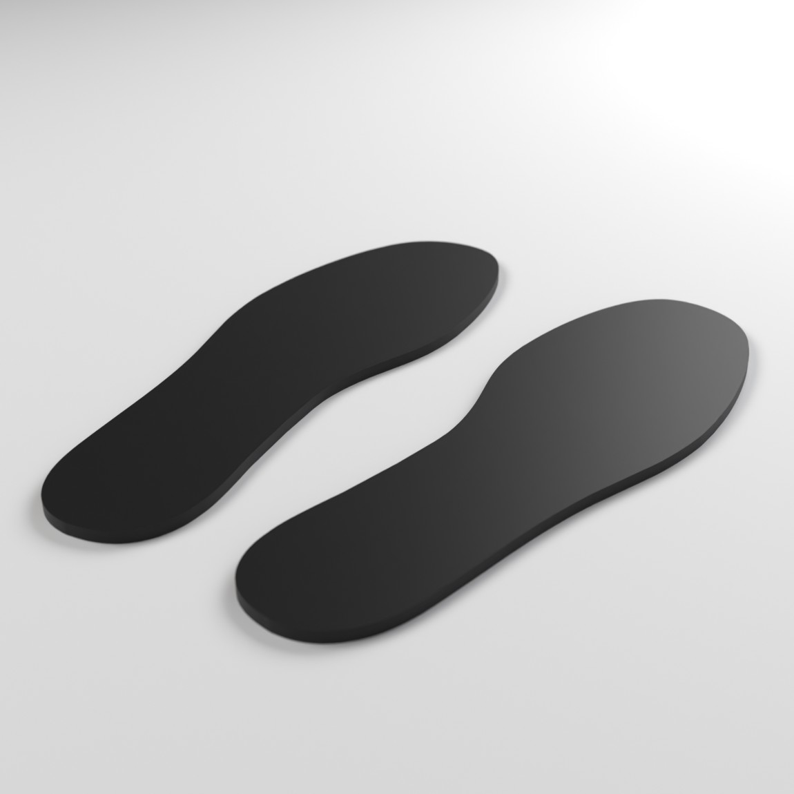 Pair of black TPU ski boot volume reducers, left and right