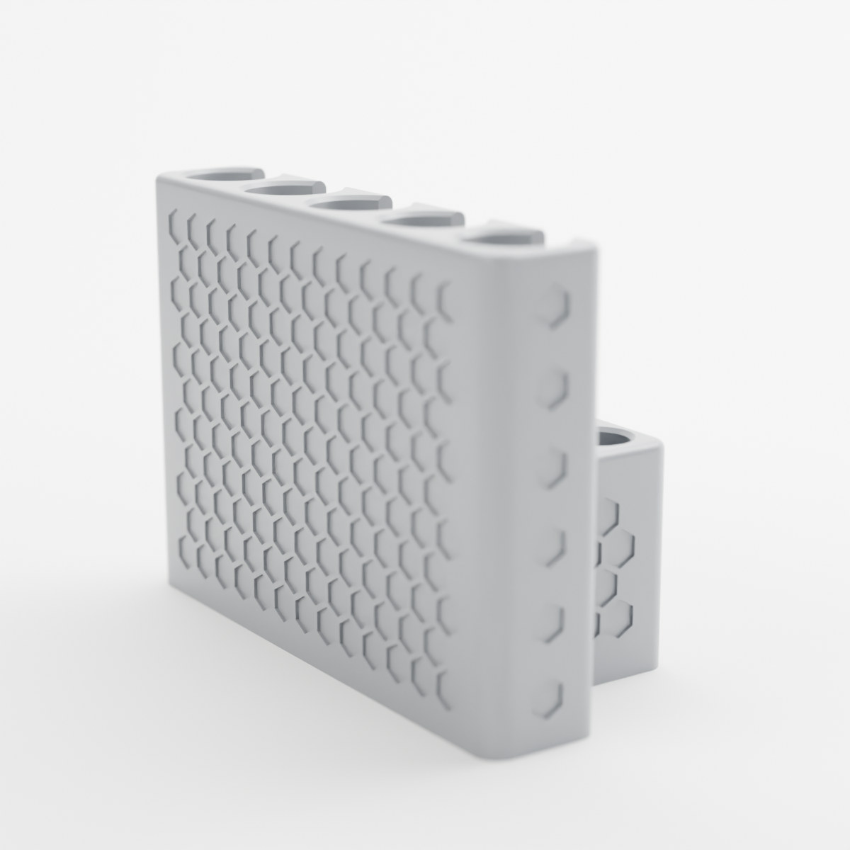 Back of the Hexagon desk stand in grey, showing the textured panel
