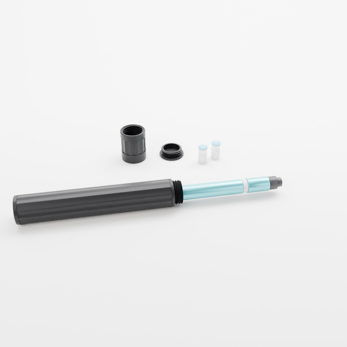 Flutes travel case in black, opened with a pen sliding out and the needle lid and spare needles beside it