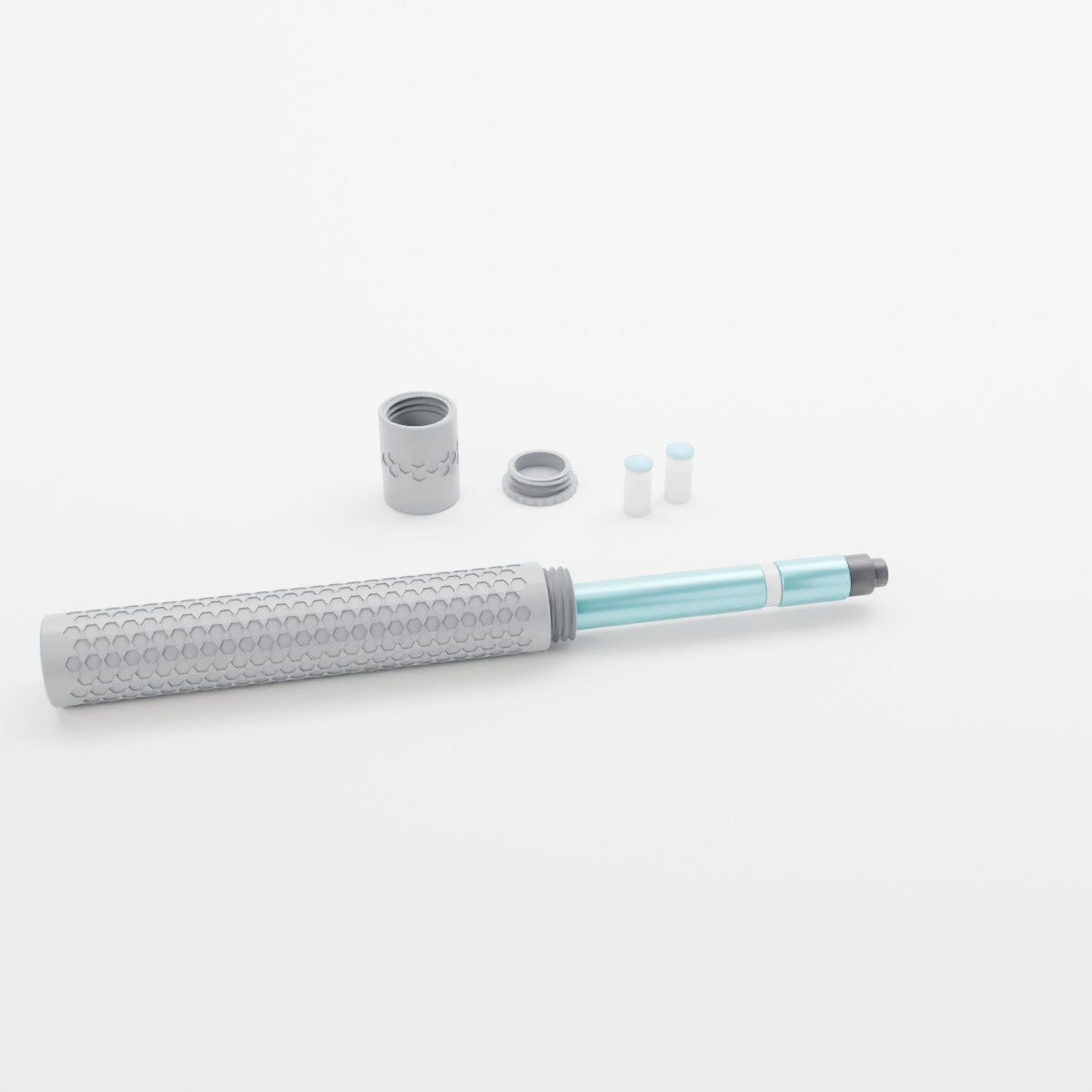 Hexagon travel case in grey, opened with a pen sliding out and the needle lid and spare needles beside it